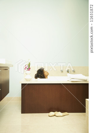 African American woman in bathtub African American woman in bathtub 11631872
