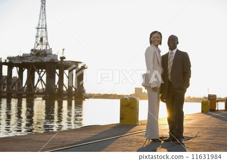African American businesspeople on commercial pier African American businesspeople on commercial pier 11631984