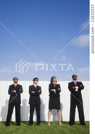 Multi-ethnic businesspeople wearing sunglasses 11632015