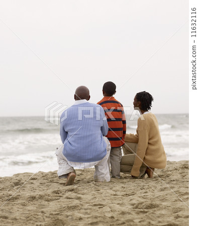 African family looking at ocean 11632116
