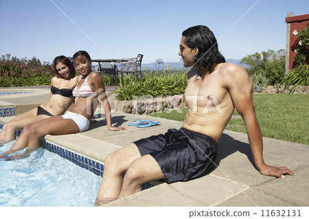 Indian man looking at multi-ethnic women Indian man looking at multi-ethnic women 11632131