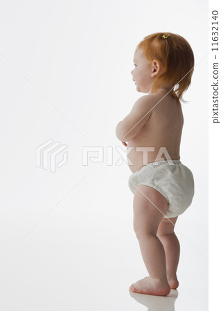 Studio shot of baby standing 11632140