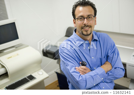 Hispanic businessman with arms crossed Hispanic businessman with arms crossed 11632141