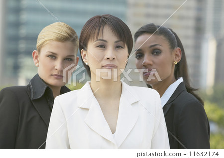 Three multi-ethnic businesswomen outdoors 11632174