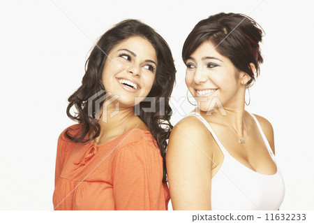 Portrait of Hispanic adult sisters 11632233