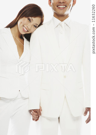 Asian couple holding hands Asian couple holding hands 11632260