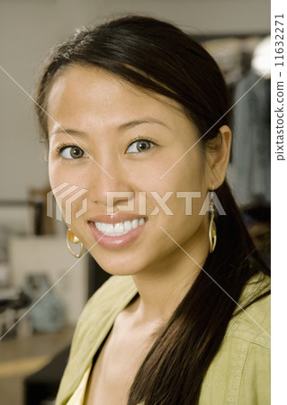 Close up of Asian woman smiling 11632271