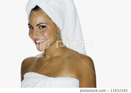 Woman wearing towel on head Woman wearing towel on head 11632385
