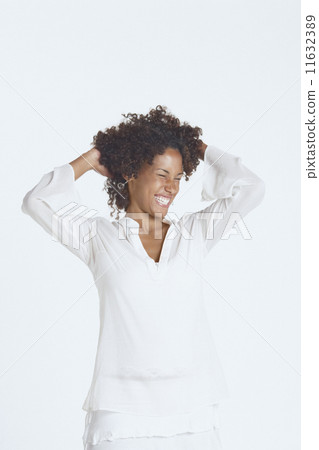 Young woman smiling for the camera 11632389
