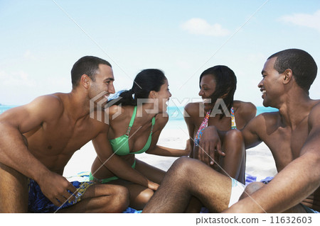Multi-ethnic couples in bathing suits 11632603