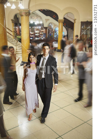 Young Hispanic couple in evening wear 11632731