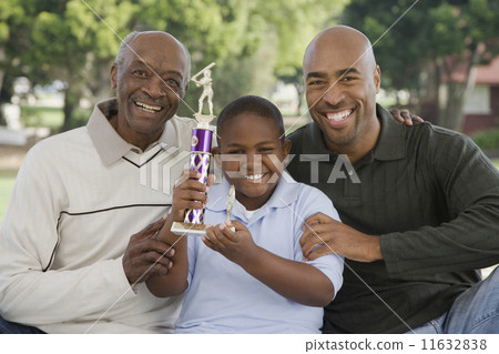 African American family with trophy outdoors 11632838
