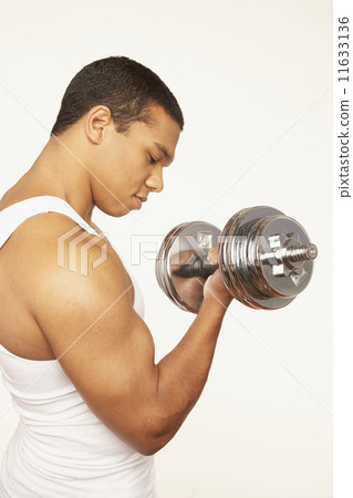 Portrait of African man lifting weights 11633136