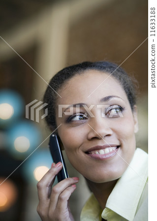 African American woman talking on cell phone 11633188