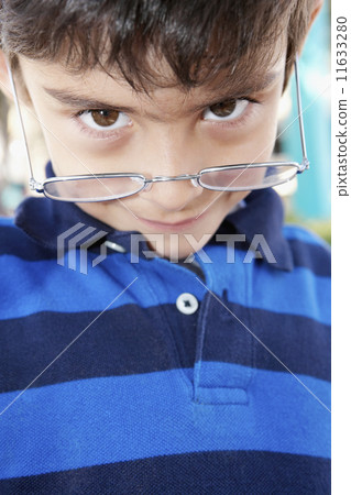 Hispanic boy wearing eyeglasses Hispanic boy wearing eyeglasses 11633280