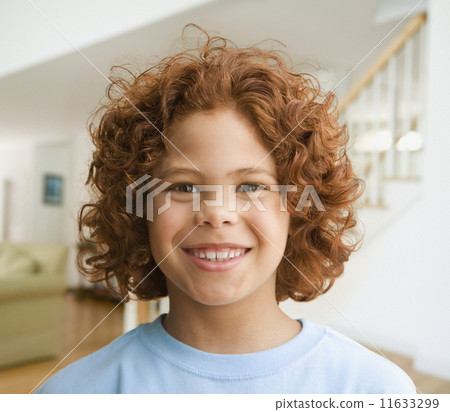 Close up of Mixed Race boy smiling 11633299
