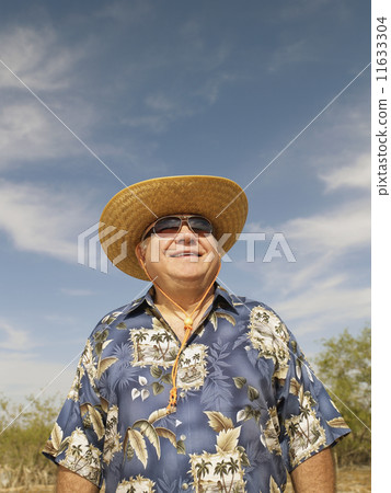 Senior Mixed Race man wearing sunhat 11633304