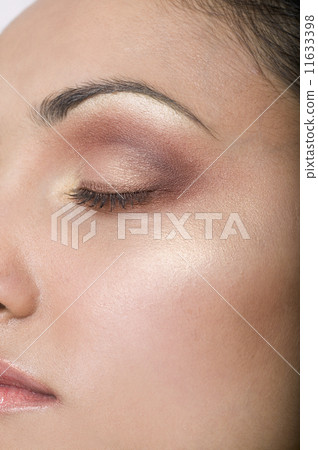 Close up of Indian woman with eye closed 11633398