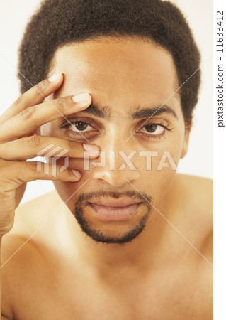 African American man with hand on face African American man with hand on face 11633412