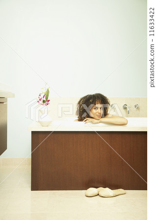African American woman in bathtub 11633422