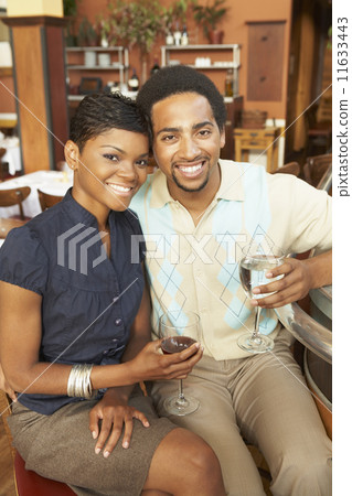 African American couple drinking wine 11633443