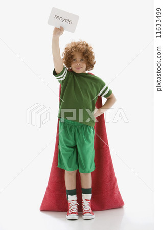 Mixed Race boy holding recycle sign 11633499