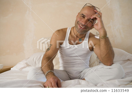 Hispanic man with eyeglasses on head 11633549