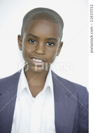 Close up of African boy in suit jacket 11633552