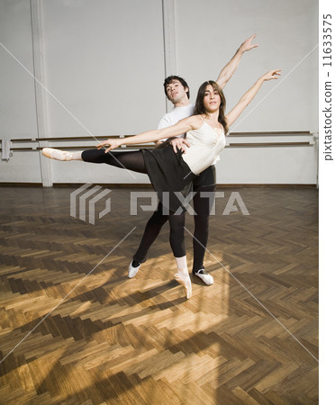Hispanic dancers practicing in dance studio Hispanic dancers practicing in dance studio 11633575