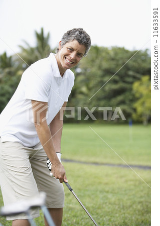 Cape Verdean woman on golf course 11633591