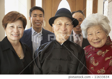 Multi-generational Asian family smiling Multi-generational Asian family smiling 11633634
