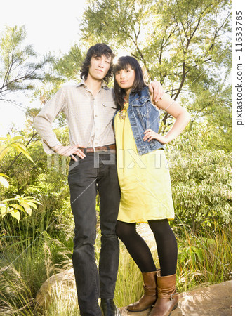 Asian brother and sister in park 11633785