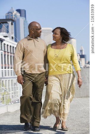 African American couple holding hands 11633939