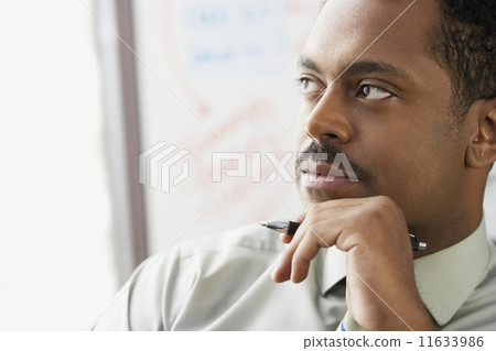 African businessman thinking African businessman thinking 11633986