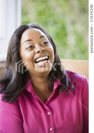 Young woman laughing 11634106