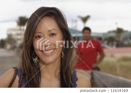 Close up of Asian woman smiling Close up of Asian woman smiling 11634169