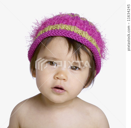 Studio shot of Asian baby wearing hat 11634245