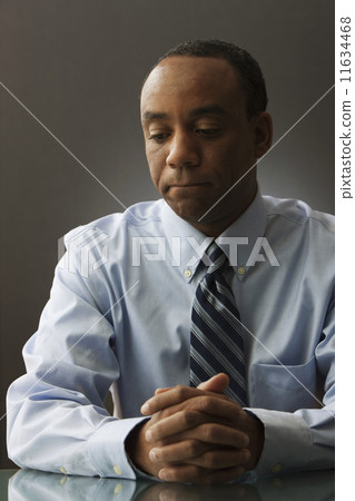 Sad African businessman Sad African businessman 11634468