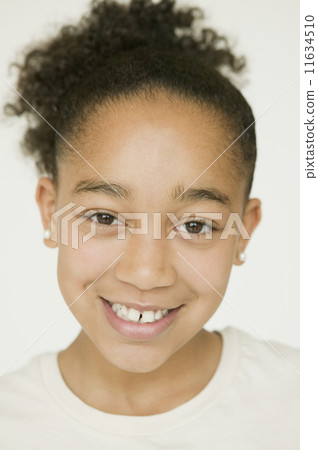 Close up of African girl smiling Close up of African girl smiling 11634510