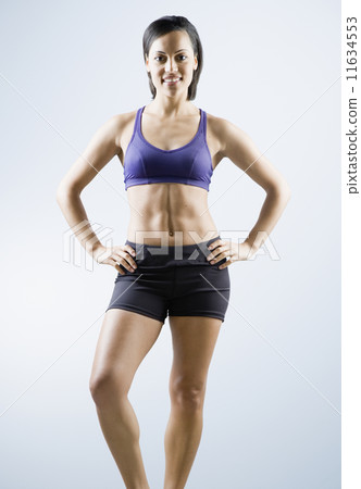 African American woman wearing athletic gear African American woman wearing athletic gear 11634553