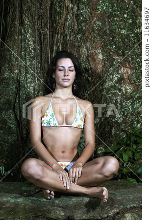 Hispanic women wearing bikinis in woods Hispanic women wearing bikinis in woods 11634697