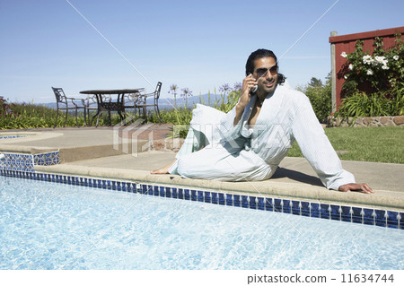 Indian man talking on cell phone 11634744