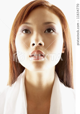 Asian woman looking up Asian woman looking up 11634770