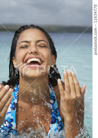 South American woman in water 11634778