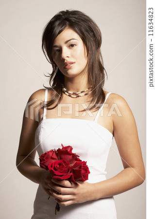 Asian bride holding flowers Asian bride holding flowers 11634823