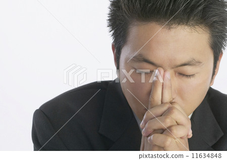 Asian businessman thinking 11634848