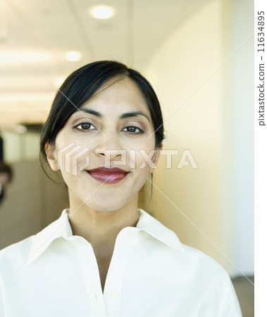 Close up of Indian businesswoman smiling 11634895