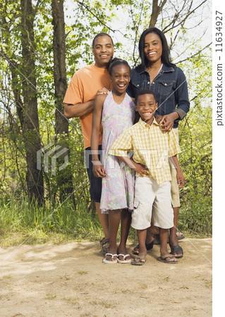 African family smiling in park African family smiling in park 11634927
