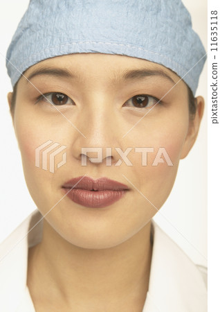 Close up of young female doctor's face Close up of young female doctor's face 11635118