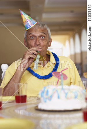 Senior man celebrating birthday 11635183